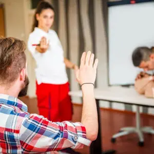 CPR training session with instructor and participants.