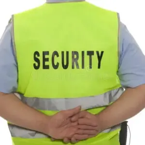 Security guard in high-visibility vest.